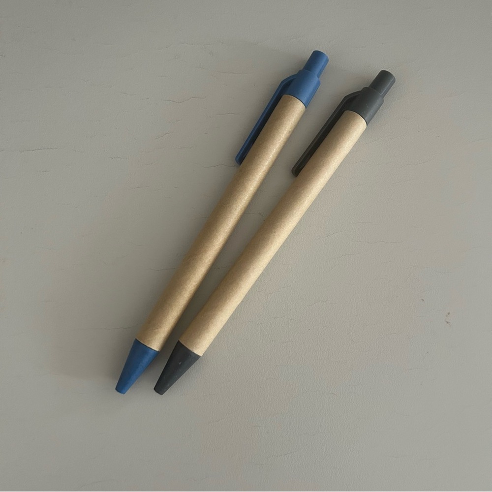 Free item: two cardboard casing pens